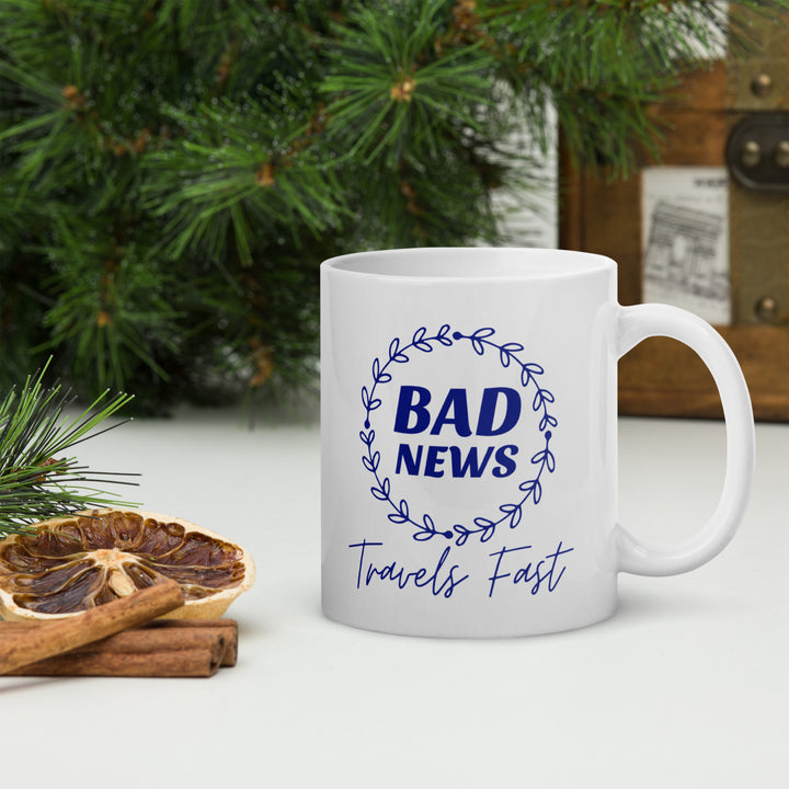 Bad News Travels Fast White glossy mug